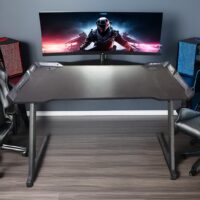 gaming desk, generic gaming desk, gaming computer desk, PC gaming desk, gamer desk, gaming workstation desk, esports gaming desk, modern gaming desk, RGB gaming desk, LED gaming desk, L-shaped gaming desk, corner gaming desk, ergonomic gaming desk, adjustable gaming desk, height adjustable gaming desk, sit stand gaming desk, large gaming desk, spacious gaming desk, compact gaming desk, minimalist gaming desk, sleek gaming desk, stylish gaming desk, carbon fiber gaming desk, metal frame gaming desk, steel frame gaming desk, durable gaming desk, heavy duty gaming desk, high quality gaming desk, premium gaming desk, budget gaming desk, entry level gaming desk, professional gaming desk, home gaming desk, office gaming desk, streaming desk, content creator desk, streamer setup desk, multi monitor gaming desk, dual monitor gaming desk, triple monitor gaming desk, wide gaming desk, deep desktop gaming desk, gaming battle station desk, gaming setup desk, workstation table, computer table, PC desk, desk for gaming setup, gamer workstation furniture, gaming furniture desk, modern workspace gaming desk, tech desk, digital setup desk, performance gaming desk, ergonomic computer desk, gaming desk with storage, gaming desk with shelves, gaming desk with drawers, modular gaming desk, customizable gaming desk, gaming desk with monitor stand, elevated monitor gaming desk, professional esports desk, tournament gaming desk, gaming desk modern design, sleek gamer workstation, high quality gaming furniture, durable gamer desk, stable gaming desk, vibration resistant desk, scratch resistant gaming desk, modern PC setup desk, gaming desk for laptops, gaming desk for desktops, gaming desk for home office, hybrid gaming office desk, productivity gaming desk, gaming desk for long hours, comfortable gaming workstation, stylish gaming setup furniture, premium esports furniture, gaming desk ergonomic design, adjustable workspace gaming desk, contemporary gaming desk design, high end gaming workstation, gaming desk built for performance, professional gaming setup furniture, gaming desk optimized for cable management, modern gaming workstation desk, gaming desk for creators, gaming desk for streaming setups, RGB workstation desk, gaming desk with sturdy frame, gaming desk for competitive gamers, gaming desk modern furniture, gaming desk aesthetic setup, gaming desk with spacious surface, gaming desk for multiple screens, gaming desk for PC builds, gaming desk for immersive setup, gaming desk designed for comfort and performance